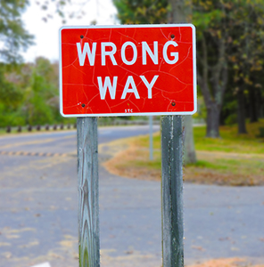 Wrong Way road sign.